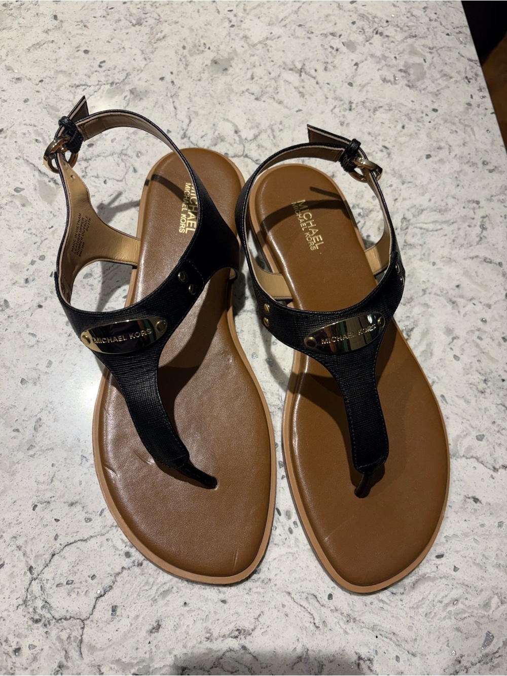Michael Kors Black T-Strap Sandals with Brown Footbed